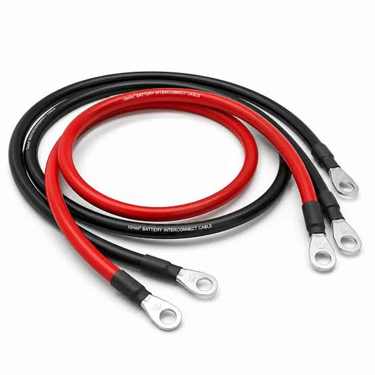 Red and black battery interconnect cable pair with ring terminals at both ends