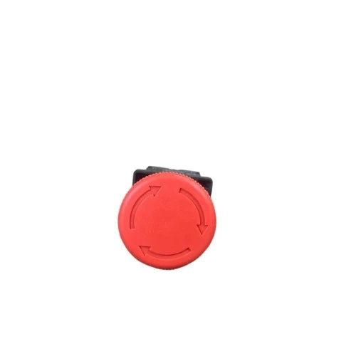 Top view of the red mushroom head with moulded twist-to-release arrows
