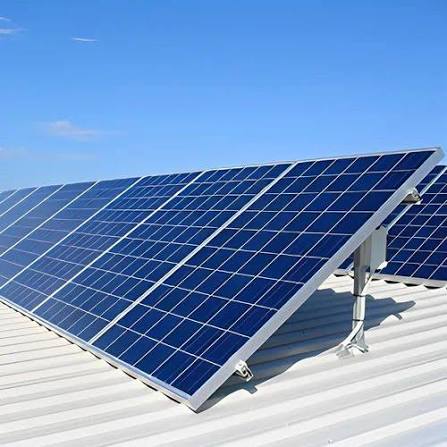 Angled view of rooftop solar panels on mounting rails